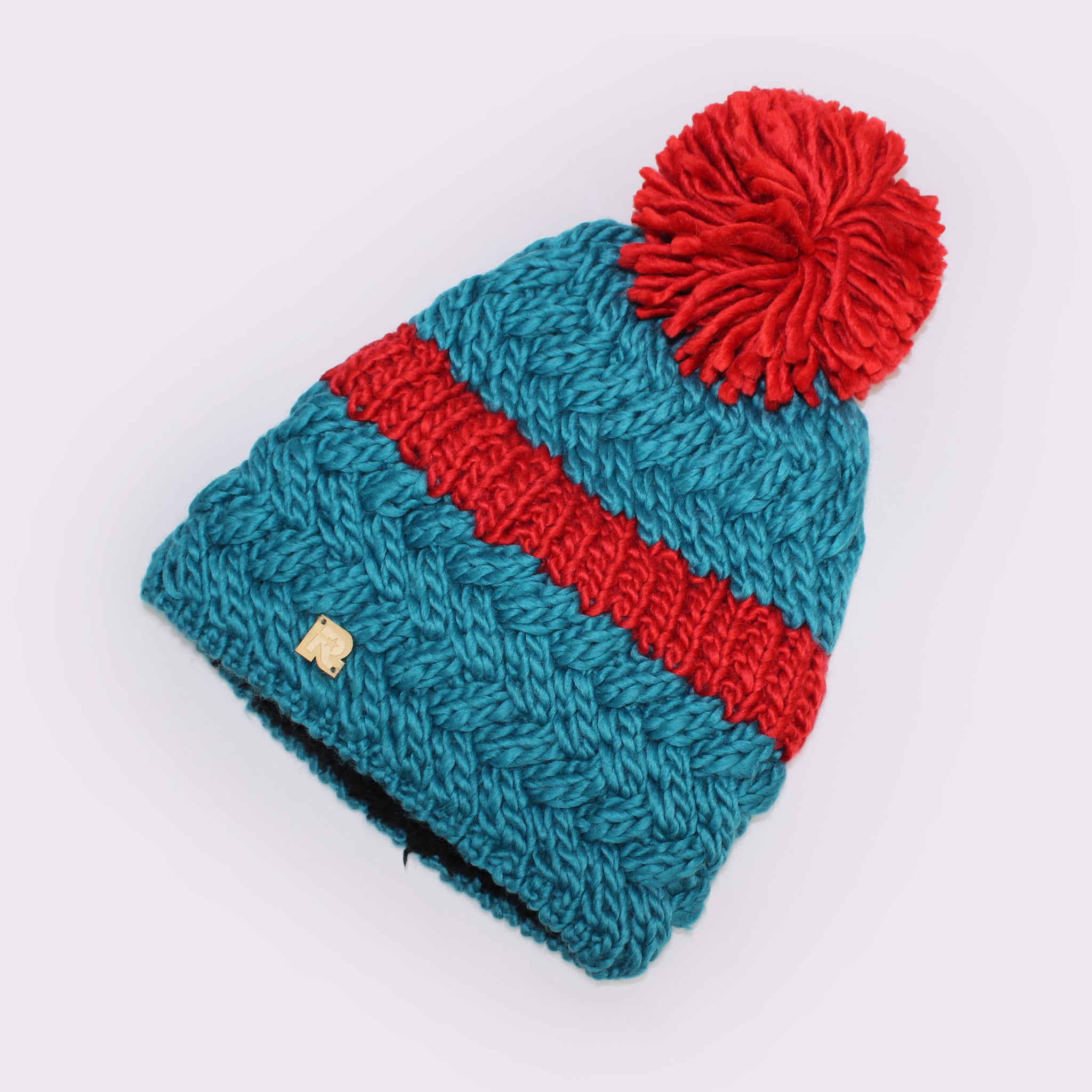 Herman（ヘルマン） ライン入りポンポンビーニー