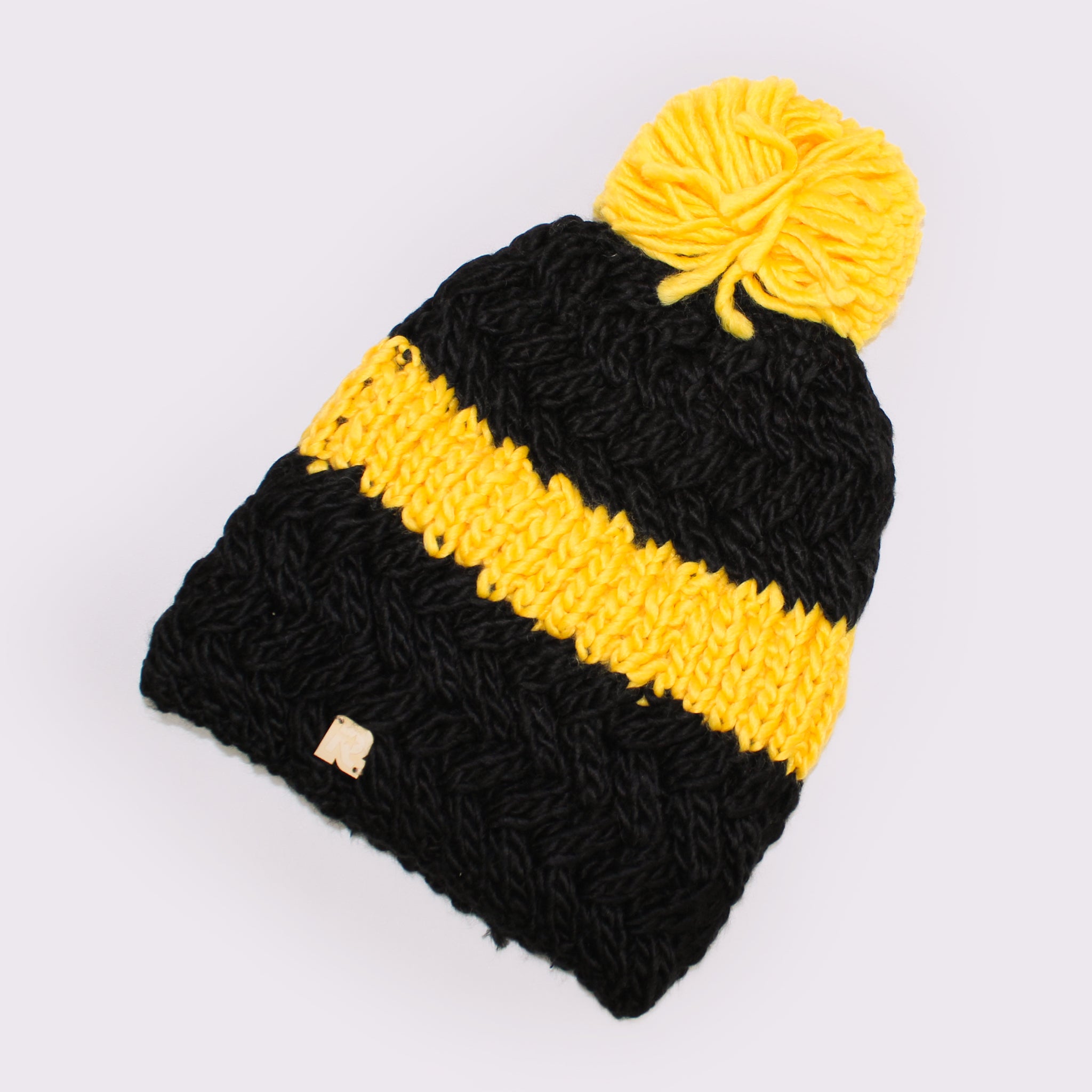 Herman（ヘルマン） ライン入りポンポンビーニー