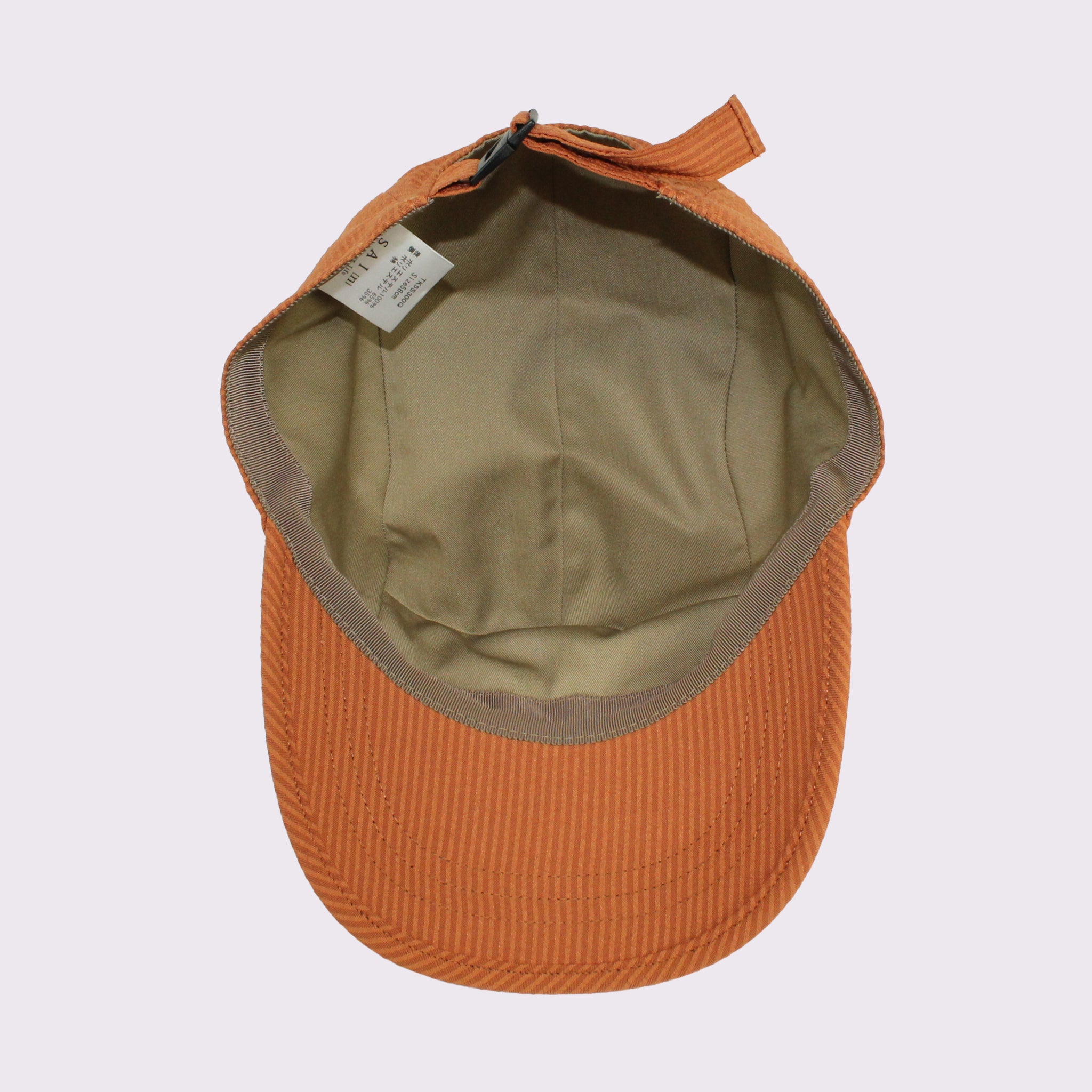 SAI[n] RUSTY CAP